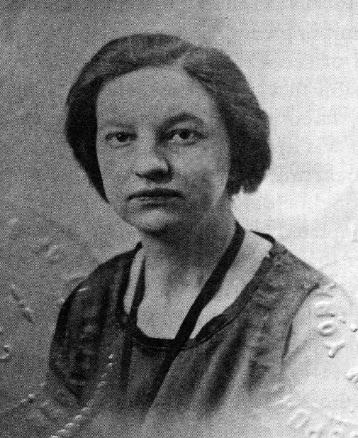Vintage black and white studio portrait of a woman with short hair