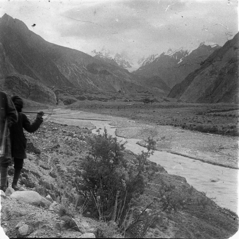 landscape photograph of a winding river in a vast valley